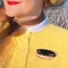 Erstwilder Eclair Au Chocolat Brooch^ Brooches
